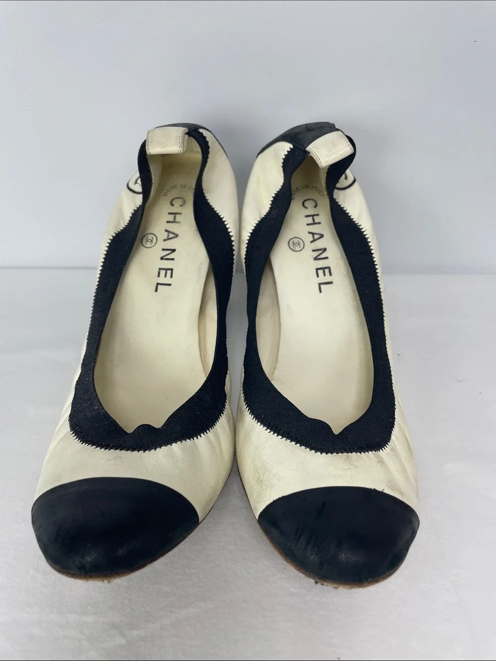 CHANEL Black & White Cap-Toe Leather Pumps